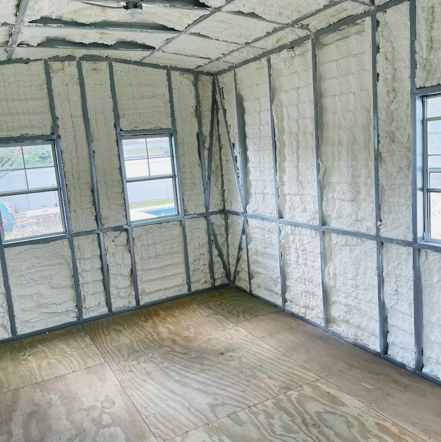 Closed-cell spray foam insulation applied to wall cavities in a residential project in Gainesville